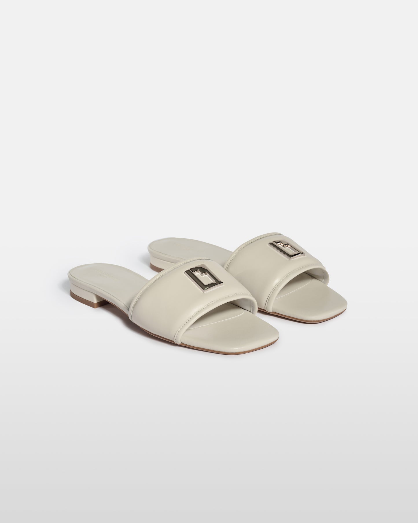 Metal Emblem Leather Sandals