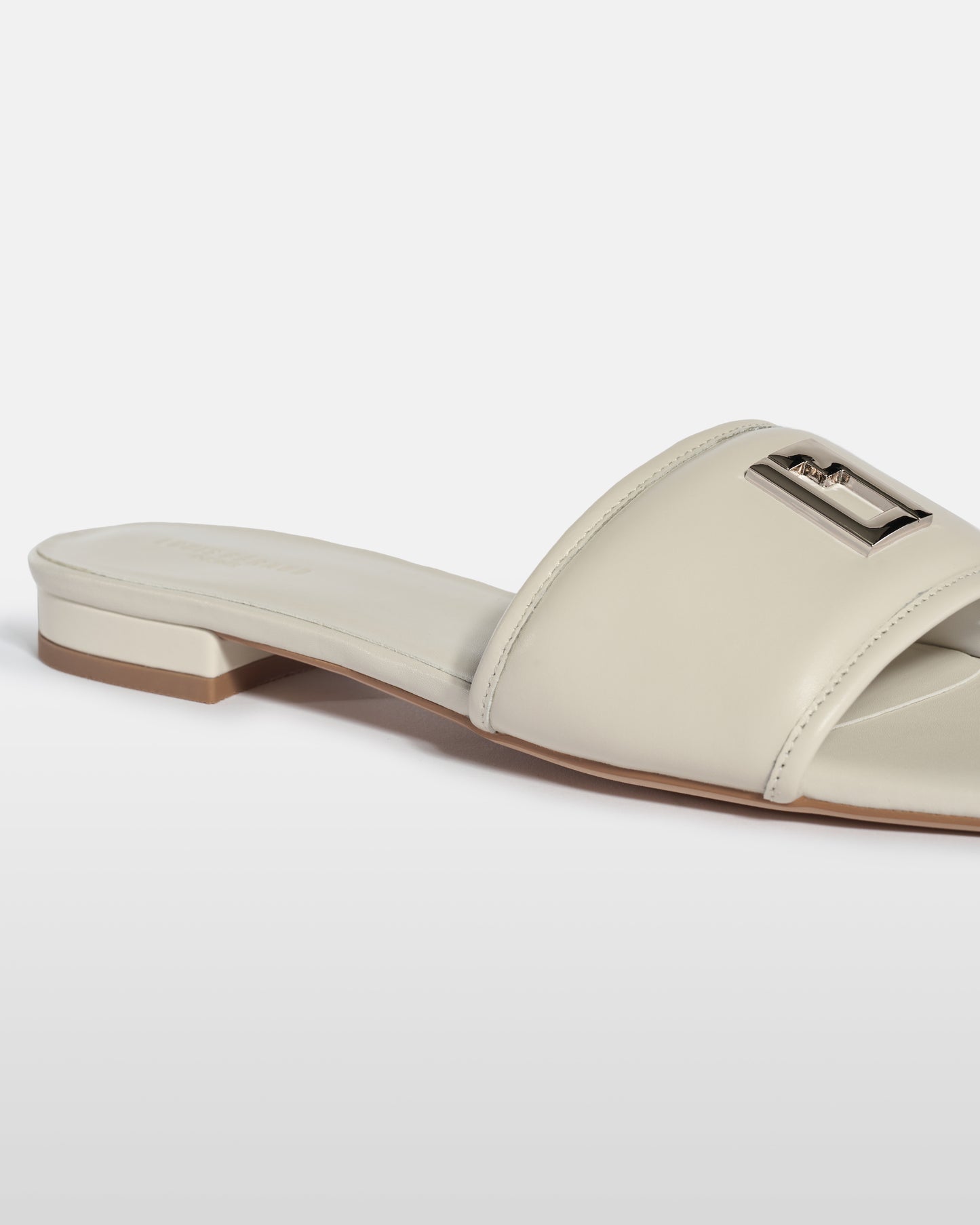Metal Emblem Leather Sandals